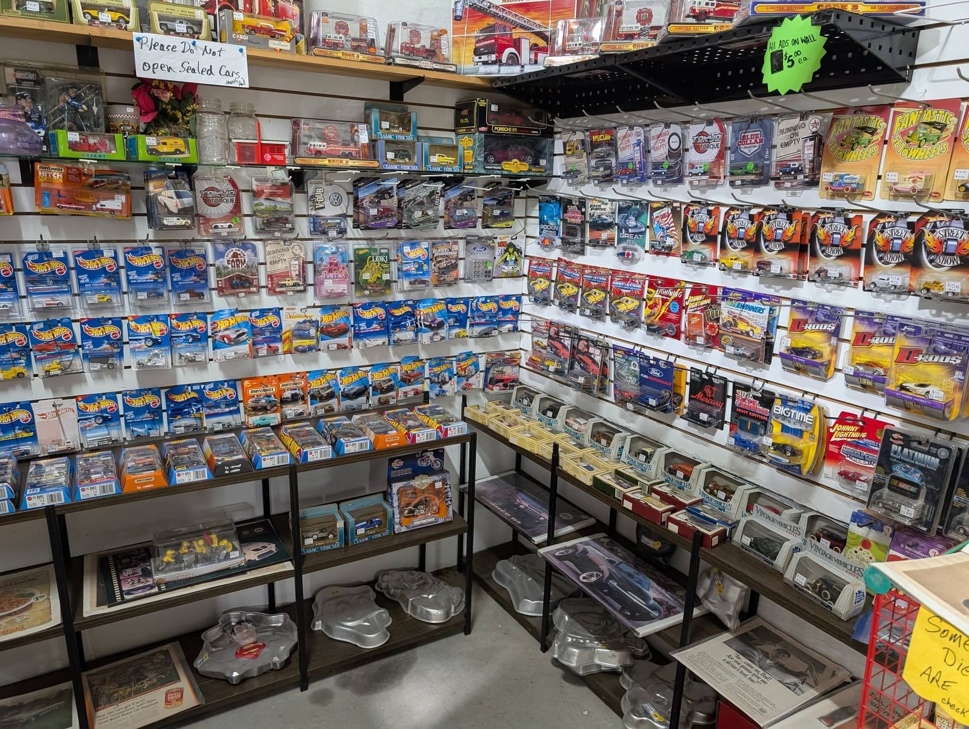 Walls of die-cast cars at a consignor booth