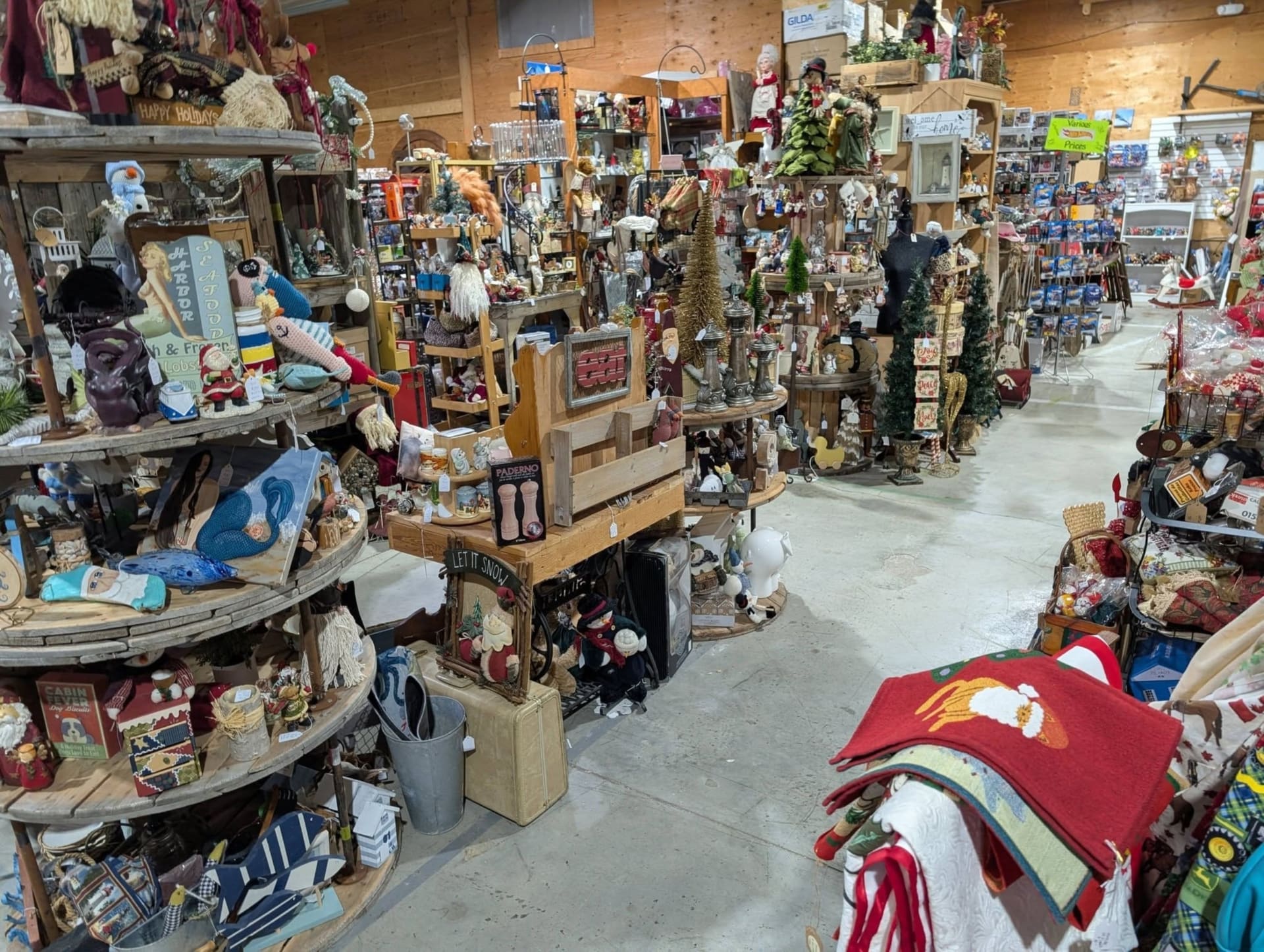 An aisle of vendor booths in the OSA Auctions antique market