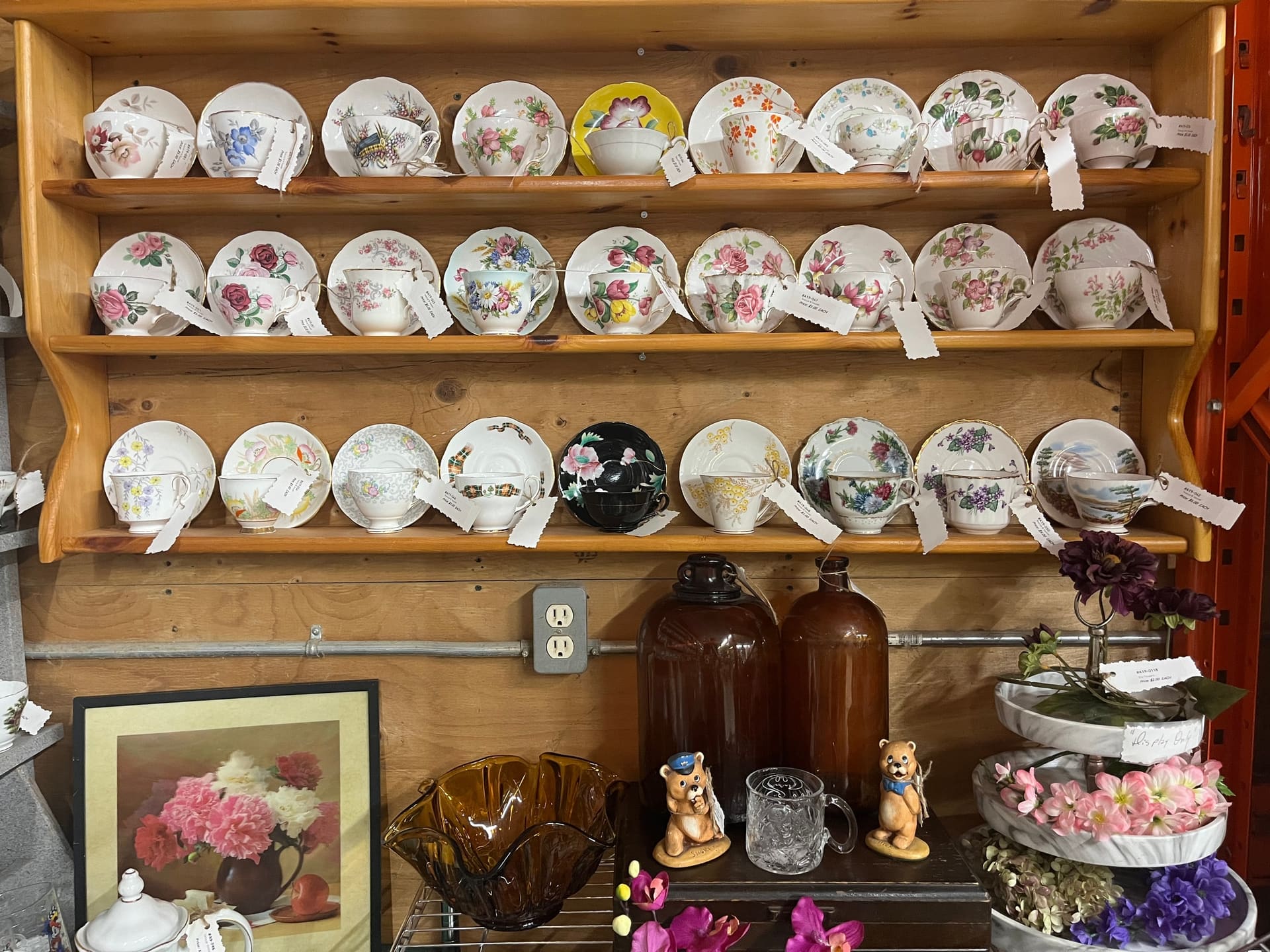 Shelves of bone china teacups and saucers