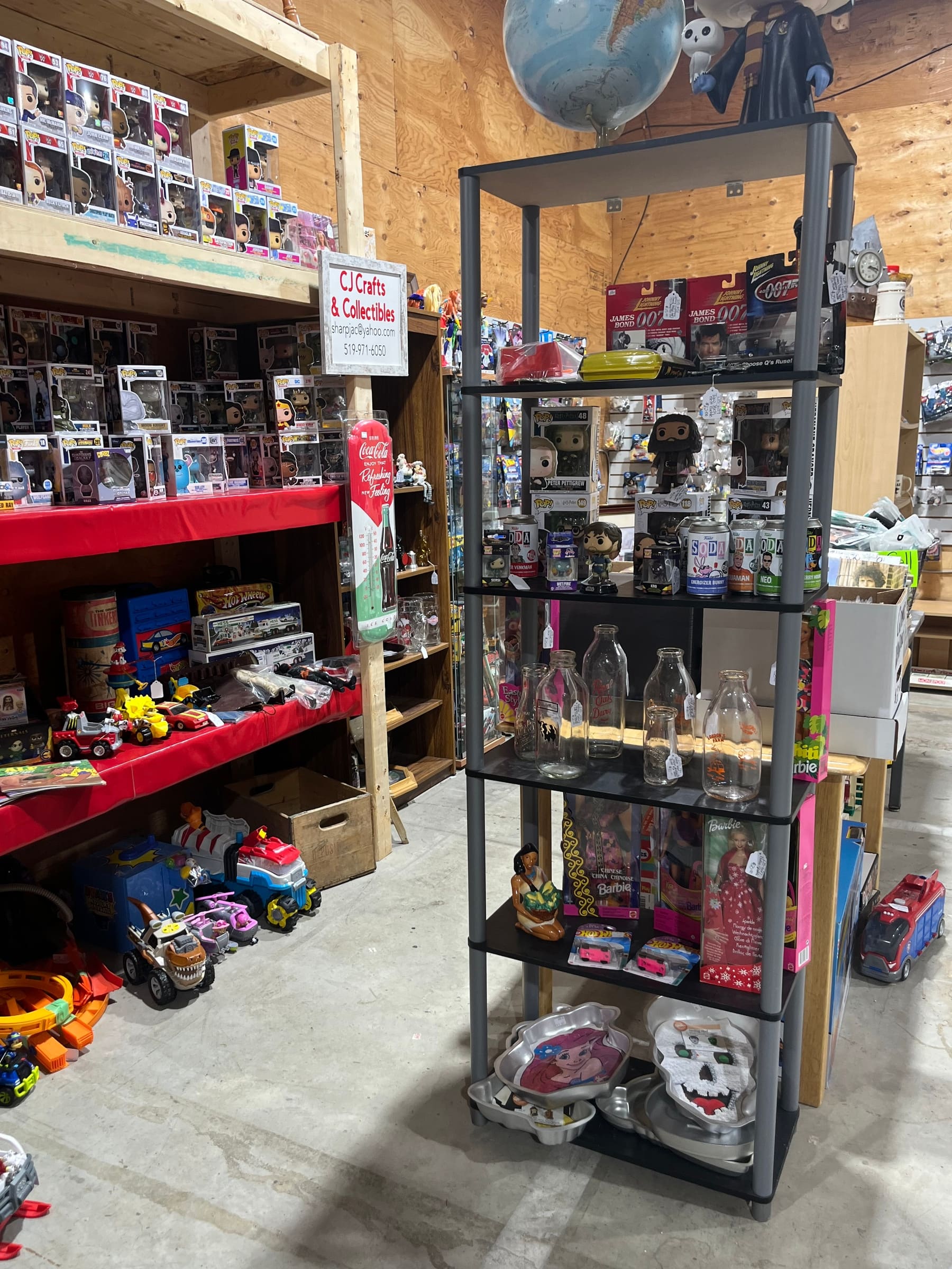 Red shelving with toys and collectibles