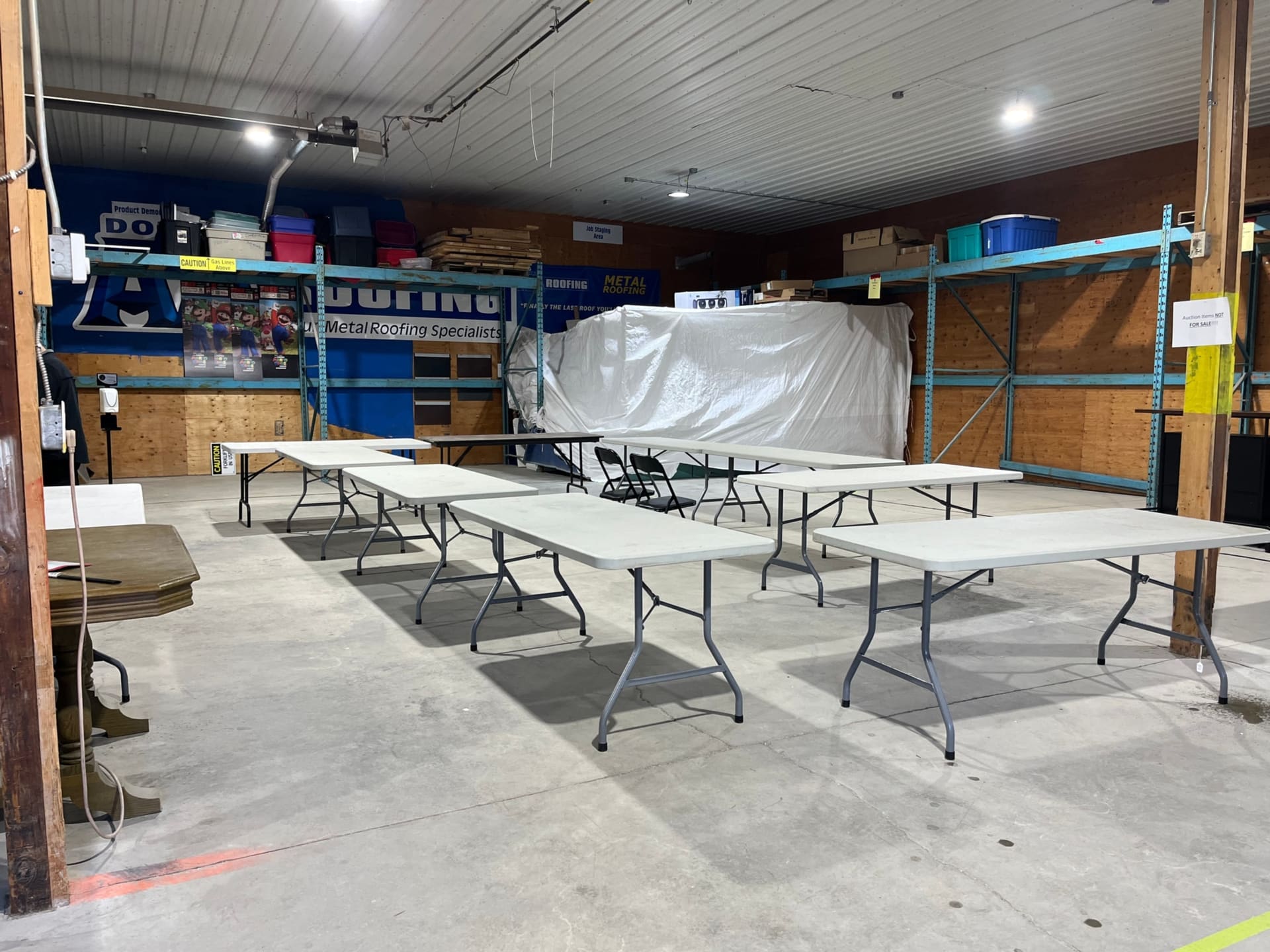 Folding tables inside the OSA Auctions building
